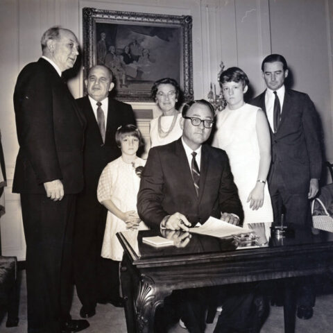 Kennedy M Crockett signs oath of office, 31 July 1967. L to R: Secretary of State Dean Rusk, Nicaragua Ambassador Guillermo Sevilla Sacasa, Terry, Mary, KMC, Linda, James Wadsworth Symington. Photo Department of State HJM