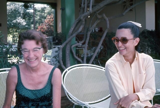 Mary Crockett and Hope Portocarrero de Somoza laugh at poolside BBQ, Aug 1967. ©KMC