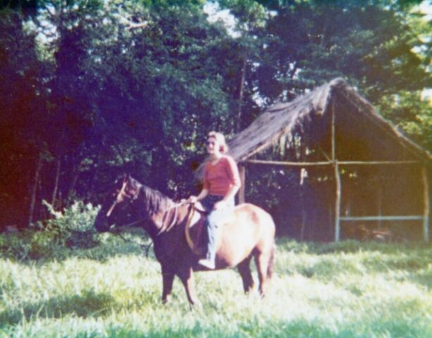 Terry on her horse at the campamento, 1976. ©KMC