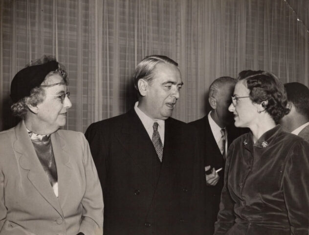 Two women and a gentleman chat during a formal gathering. Zoe Campbell (Mary’s mother), US Ambassador to Mexico William O’Dwyer, and Mary Crockett, Mexico City, México, Dec 1950. ©KMC