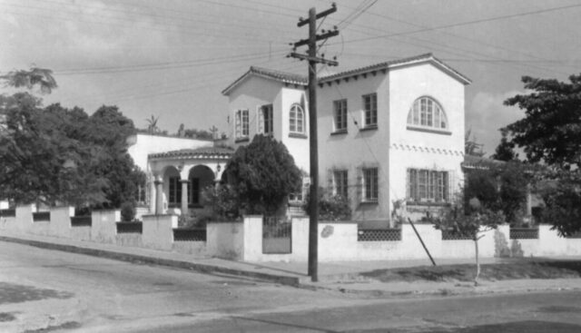 A large two story colonial style house on a corner in Tampico, México, where the Crocketts lived between 1952-1955. ©KMC