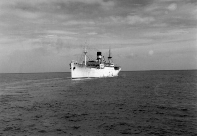 A large ship. the Standard Fruit Company banana boat, ‘SS Cefalu,’ is seen in the ocean. La Ceiba, Honduras, 1947. ©KMC