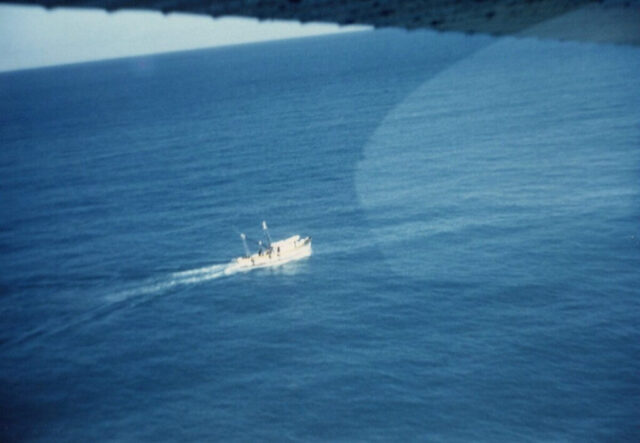 A US shrimp pirate boat in blue water off Mexico’s Gulf Coast is seen from the air, 1952. ©KMC