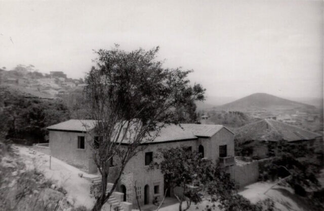 A two story terra cotta tiled house in Tegucigalpa, Honduras, 1947. ©KMC