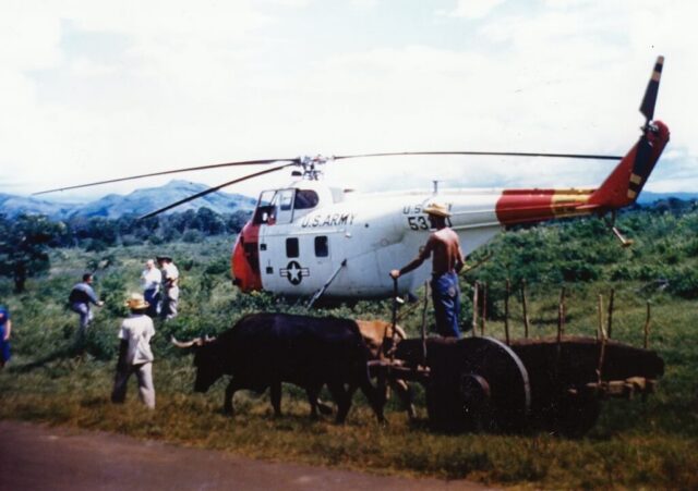 IAGS helicopter waiting for Senator Ellender at the junction of the Pan American Highway and Rama Road, Nicaragua, 1958. ©KMC