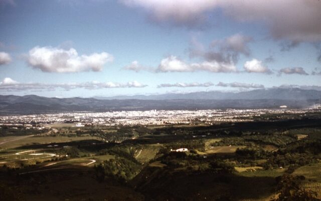 Aerial view of Guatemala City, Guatemala, and surrounding countryside, 1958. ©KMC
