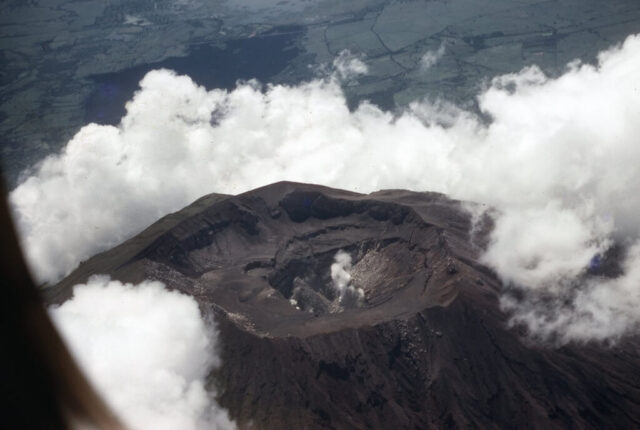 Aerial of Momotombo's crater on the north shore of Lake Managua, Nicaragua, 1958. ©KMC