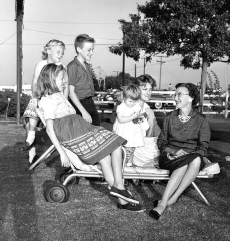 Mary Crockett with her kids sitting on a lawn chair in Chula Vista, California, 1960. From L to R: Judy, Linda, Jack, Terry, Laura, and Mary. Photo San Diego Historical Society-Ticor Collection